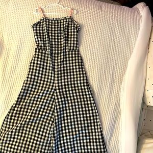 Adorable one piece jumper with flare legs.